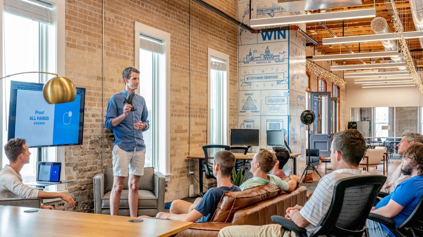 Bright open-plan office during a team meeting